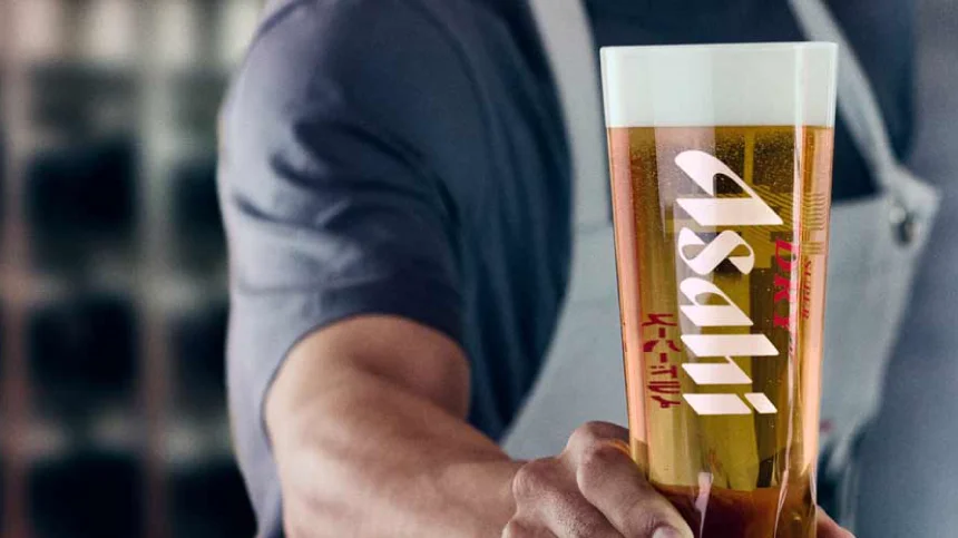 Asahi Super Dry pint served on a bar counter