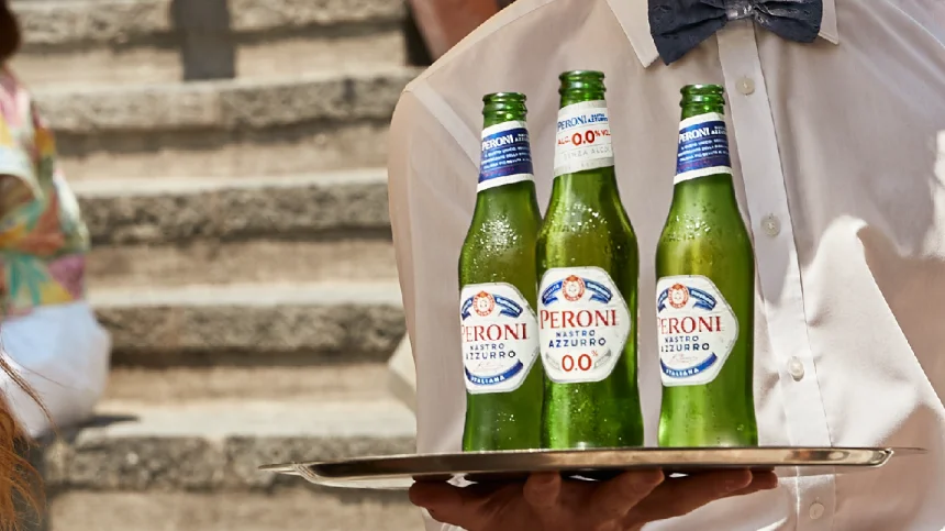 Peroni Nastro Azzurro bottles served on a tray